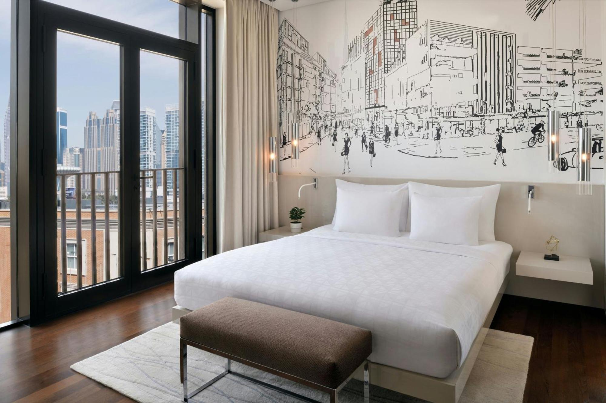 ลา วีลล์ โฮเทล แอนด์ สวีท ซิตี้วอล์ก ดูไบ ออโตกราฟ คอลเลกชัน Hotel ภายนอก รูปภาพ A bedroom at the hotel